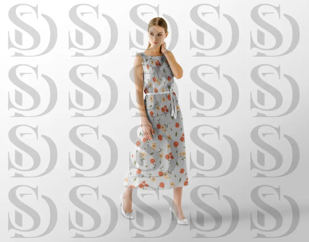 Peach blossom floral pattern displayed on a flowing dress mockup