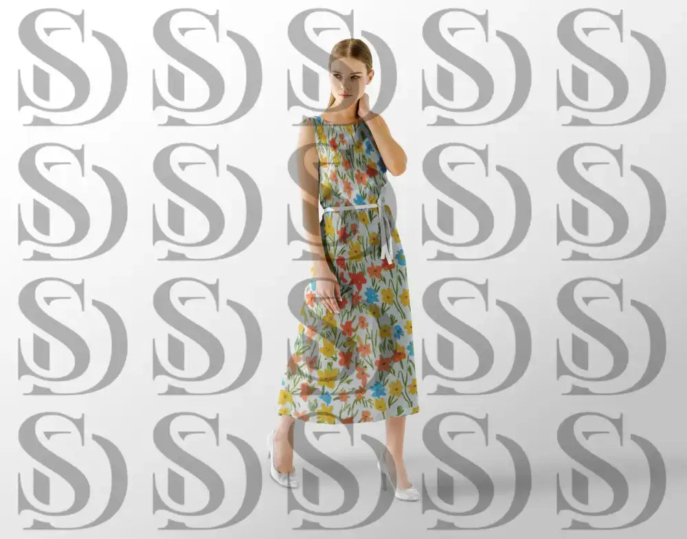 Woman wearing dress made with colorful summer floral seamless pattern