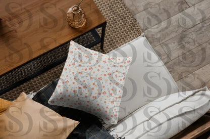 Decorative cushion featuring a vintage peach blossom floral pattern
