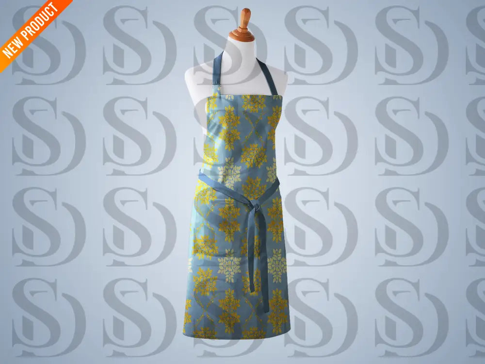 Kitchen apron mockup using blue and gold botanical seamless pattern