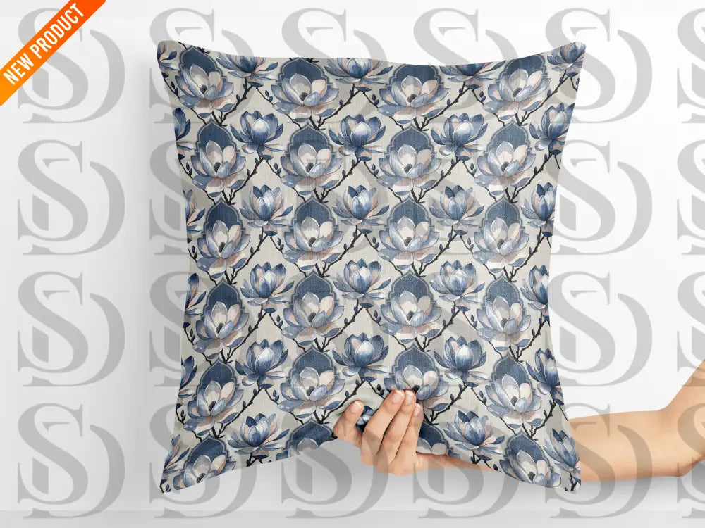 Decorative cushion mockup featuring blue magnolia floral fabric pattern