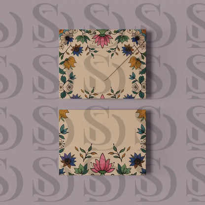Envelope and card mockup showcasing Mughal floral frame artwork displayed on a soft lavender background.