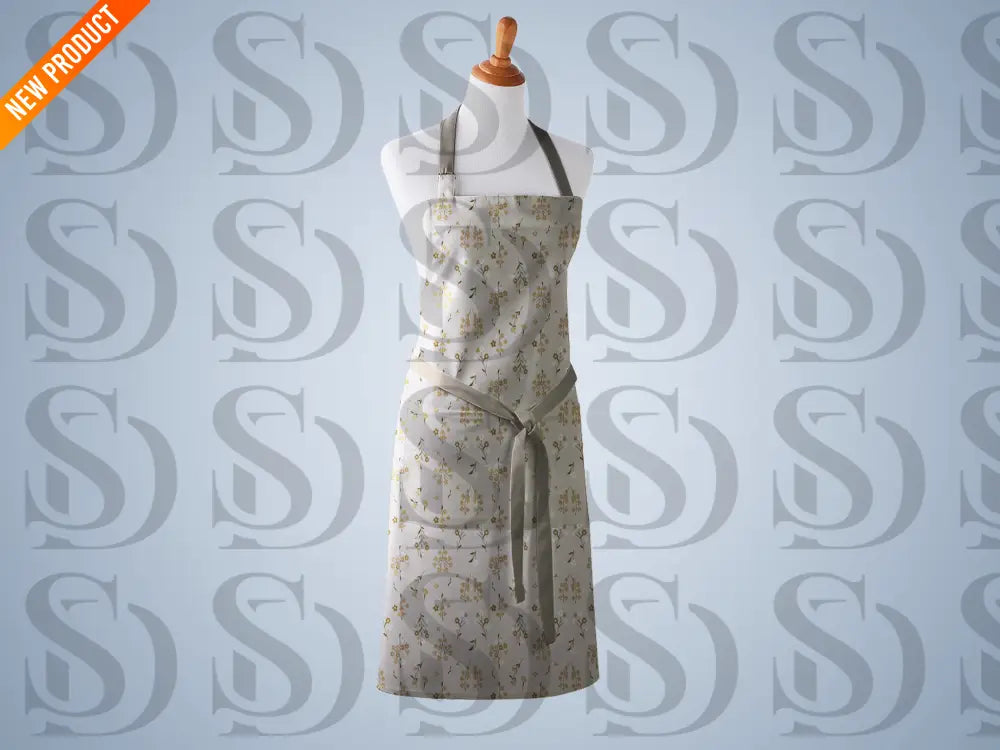 Neutral floral patterned apron with delicate botanical sprigs