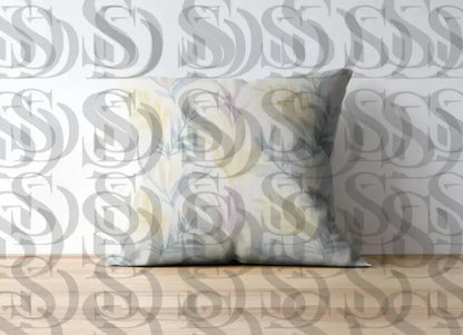 Decorative cushion featuring a soft pastel botanical leaf seamless pattern