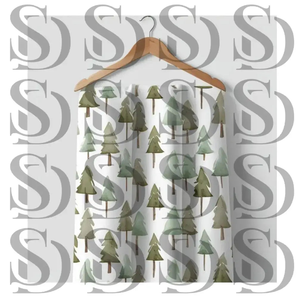 Close-up view of watercolor pine trees in a repeating forest pattern