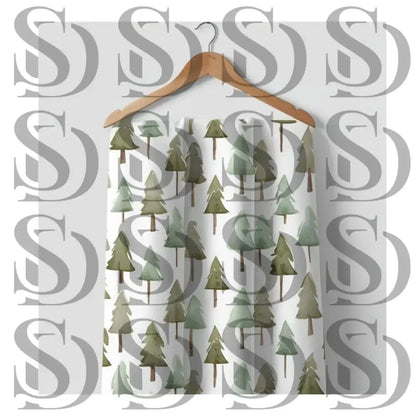 Close-up view of watercolor pine trees in a repeating forest pattern